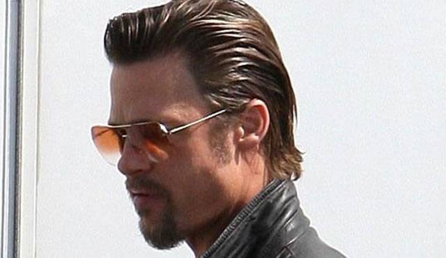 Brad Pitt e mëson djalin e tij për luftën